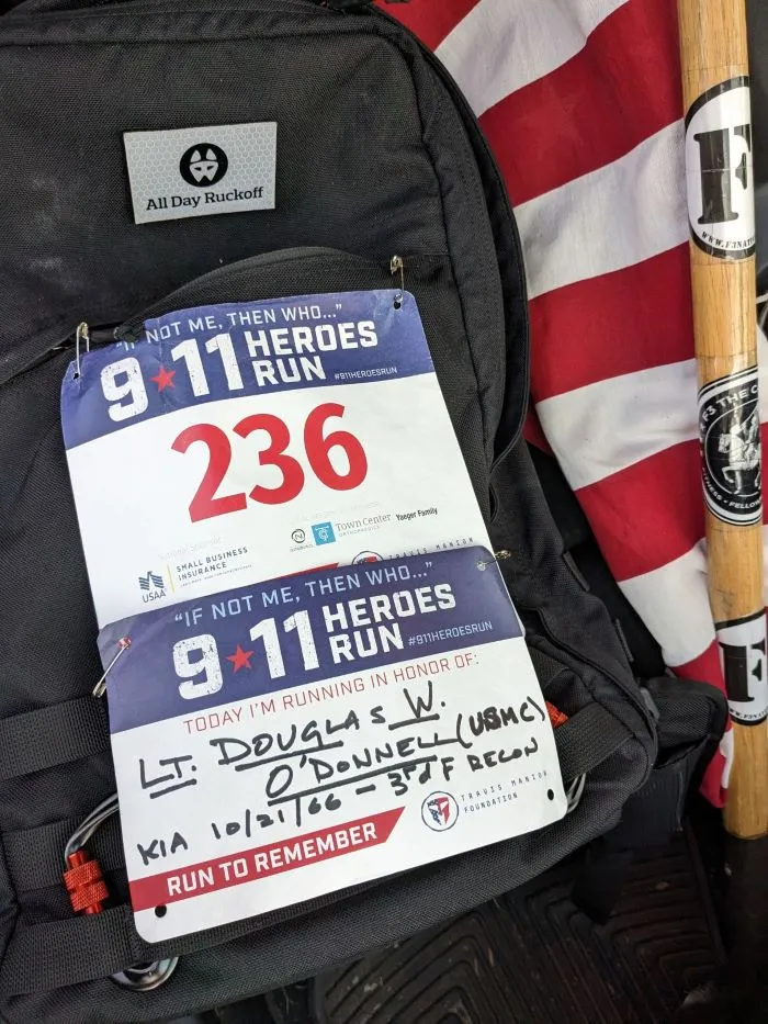 My rucksack adorned with the bib I wore during the 2023 Travis Manion Foundation 9/11 Heroes Run